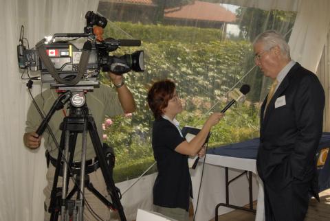 Robert H.N. Ho interviewed by OMNI News, Reception Celebrating Donation to Buddhist Studies Made by Tung Lin Kok Yuen, Marquee Tent Event Space, Miller Lash House Gardens