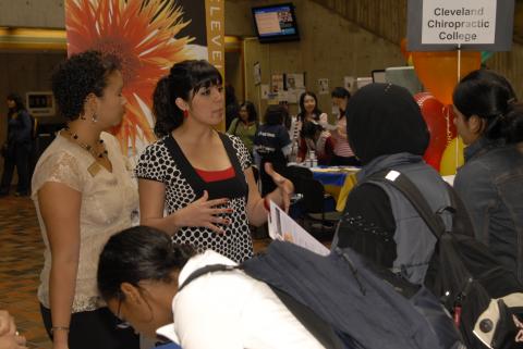 Students at a Booth at Grad Fair 2007