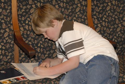 Child Writing, Bring our Children to Work Day