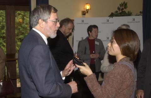 Paul Thompson Speaks to Woman with Recorder, Celebration of the Signing of the Agreement for the Joint Programs (Centennial College and UTSC) in Journalism and Paramedicine, Miller Lash House