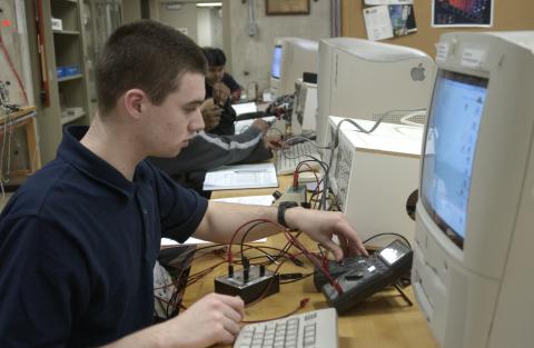 Student Works in Physics Lab