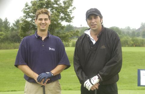 Two Players Pose for Photograph, Management Alumni Association Golf Tournament, 2002, Deer Creek Golf Club