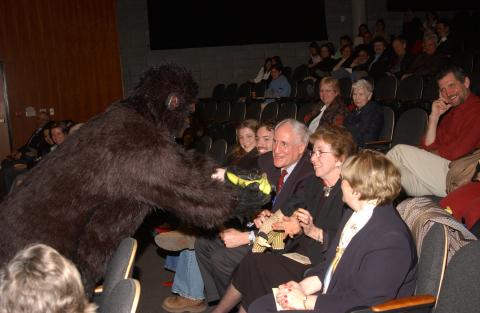 Unidentified Graduate Student in Costume offers Bananas to Frances Burton (holding Toy Monkey), Audience, Social Sciences Awards Event, ARC Lecture Theatre, Academic Resource Centre