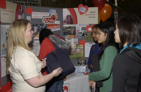 Students with Presenter at Table, Heart and Stroke, Volunteer Fair, the Meeting Place