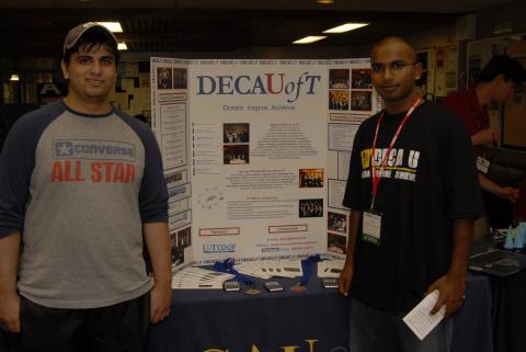 Student Representatives at DECA Table, Clubs Event, the Meeting Place