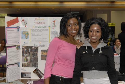 African Students Association, Students at Table with Poster, Clubs Event, the Meeting Place
