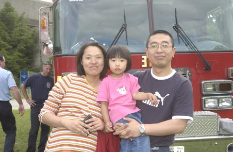Summerfest, Family Poses with Fire Truck