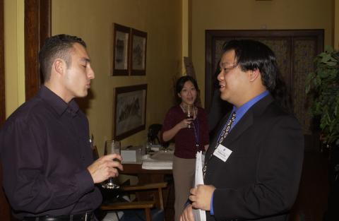William Hsia Socializes with Event Attendee, Management and Economics Student Association (MESA) Networking Event, Miller Lash House