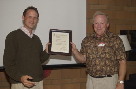 Jim Dahl Receives Certificate of Appreciation for Christian Children's Fund of Canada, International Development Studies Potluck, Faculty/Staff Lounge, H-Wing