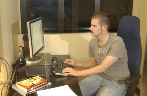Student at Computer in AccessAbility Office