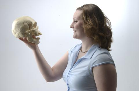 Student with Skull, Anthropology Program, Promotional Image