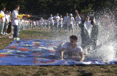 Students Run through Water, Orientation