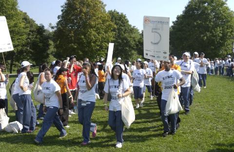 Students Outdoors, Marching with Shinerama Sign, Orientation, 2005