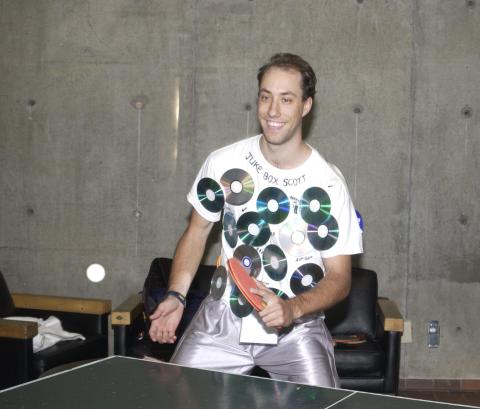 Student in Costume Shirt Plays Table Tennis, Spirit Event, the Meeting Place