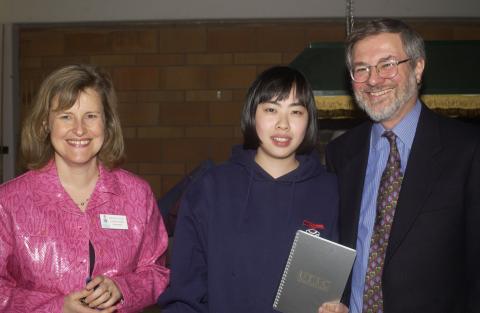 Maria Dyck and Paul Thompson Pose for Photograph with Presentation Recipient, "The Meeting Space for Great Minds"  Volunteer Event, Staff/Faculty Lounge