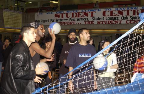 Students Toss Soccer Balls into Net, Carnival Game, Spirit Event, the Meeting Place