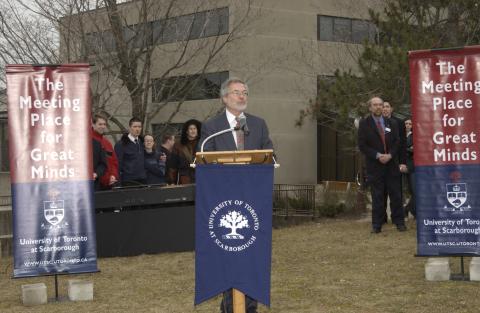 Paul Thompson Speaking, with Banners and Group of Dignitaries, Groundbreaking Event for Student Centre, Outdoors on Site