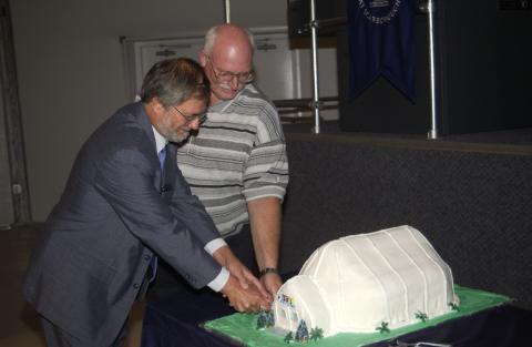 Paul Thompson and Unidentified Dignitary Cut Celebration Cake, Opening Event for UTSC Pavilion (Temporary Lecture Space)