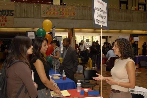 Students Talk with Representative, Graduate and Professional Schools Fair, the Meeting Place