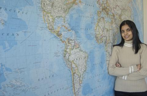 Student in Front of Map, Environmental Science, Promotional Image