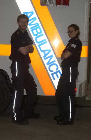Two Students Standing by Ambulance, Joint Program in Paramedicine, Centennial College, UTSC, Promotional Image