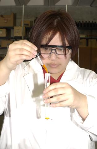 Student using Chemistry Lab Equipment