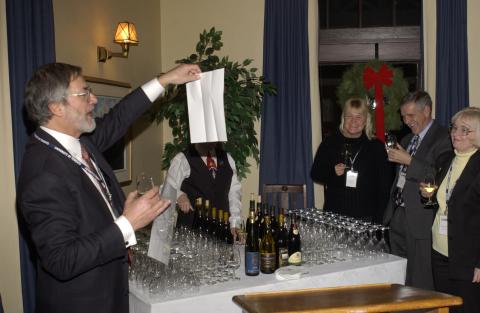 Paul Thompson Leads Wine-Tasting Event, Advancement Christmas Party