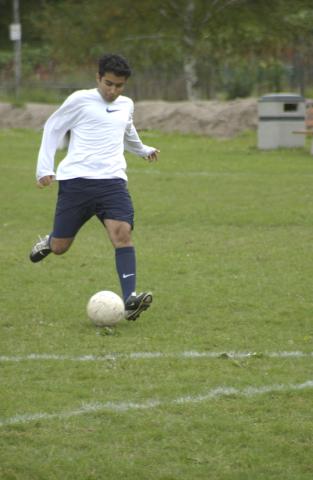 Student Playing Soccer