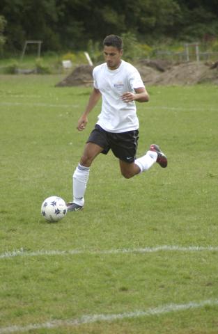 Student Playing Soccer