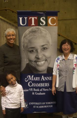 Mary Anne Chambers poses with her Banner, Great Minds Campaign event, the Meeting Place