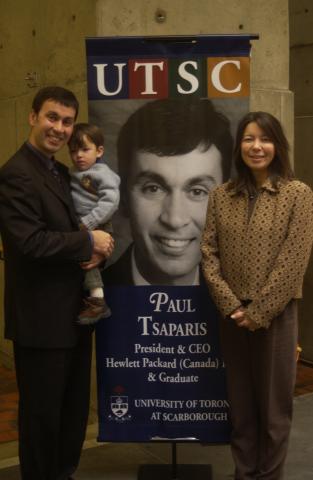 Paul Tsaparis and Family with his Banner at Great Minds Event, Meeting Place