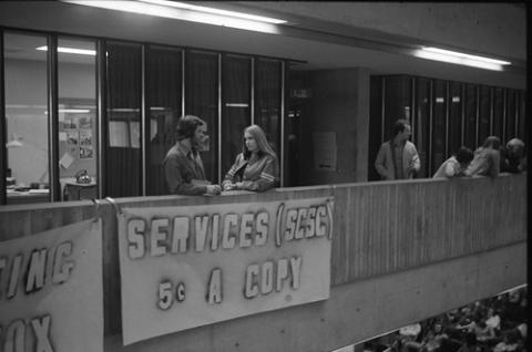 Two Students on Balcony Above The Meeting Place