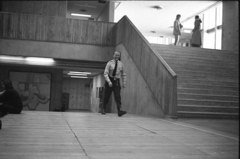 Staff Walking up Stairs in The Meeting Place