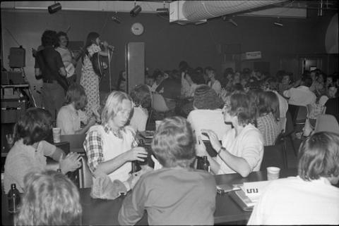 Band Performing for Seated Students in College Pub