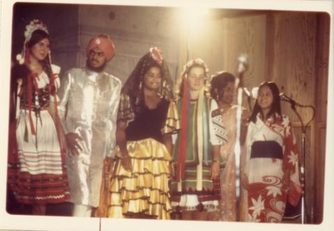 Students Onstage in Cultural Outfits