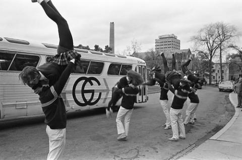 Cheerleaders in King's College Circle in Front of Bus