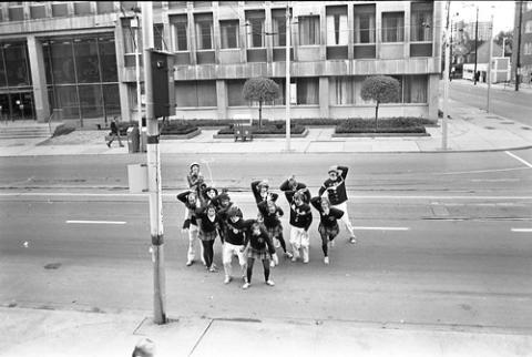 Cheerleaders on Street in Homecoming Parade