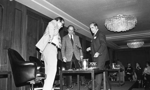 Pierre Trudeau Getting Seated Onstage