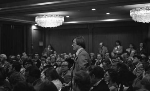 Person Standing in Crowd at Pierre Trudeau Event