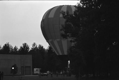 Hot Air Balloon Behind Trees