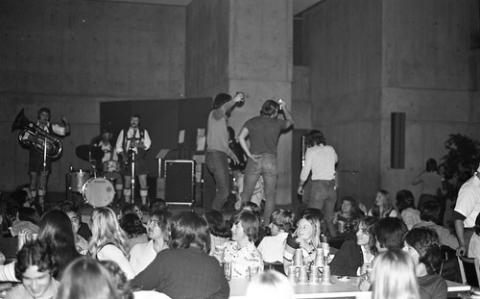 Students Onstage with Band in The Meeting Place