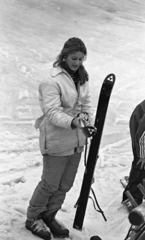 Student Standing with Skiis