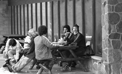 Group of Students Seated at Picnic Table