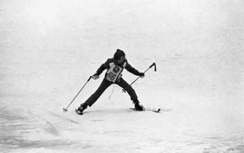 Student Skiing Down Hill