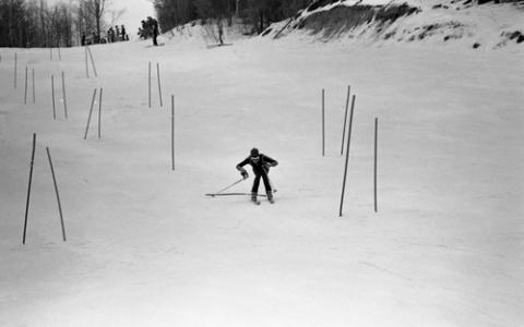 Person Skiing Through Course