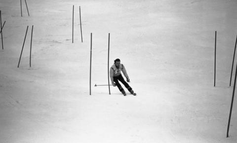Student Skiing Through Course