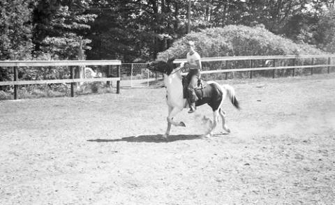 Student Riding Horse