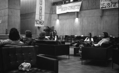 Group of Students Seated on Chairs and Couches in The Meeting Place