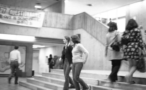 Students Walking on Stairs in The Meeting Place