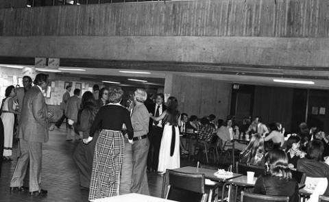 Crowd of People Standing and Seated in The Meeting Place